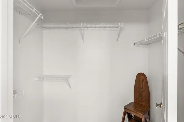 a view of a room with rack and dryer