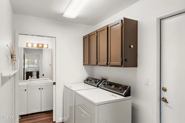 a utility room with dryer and washer