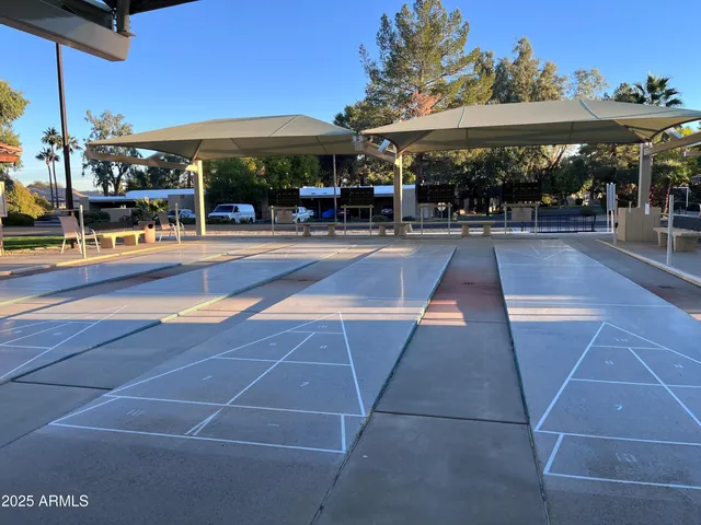 a view of a building with a garden