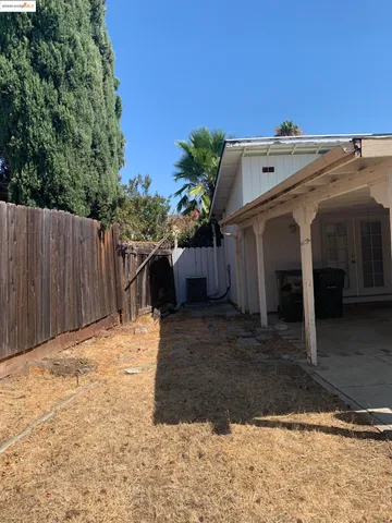 a view of balcony with wooden floor and outdoor space