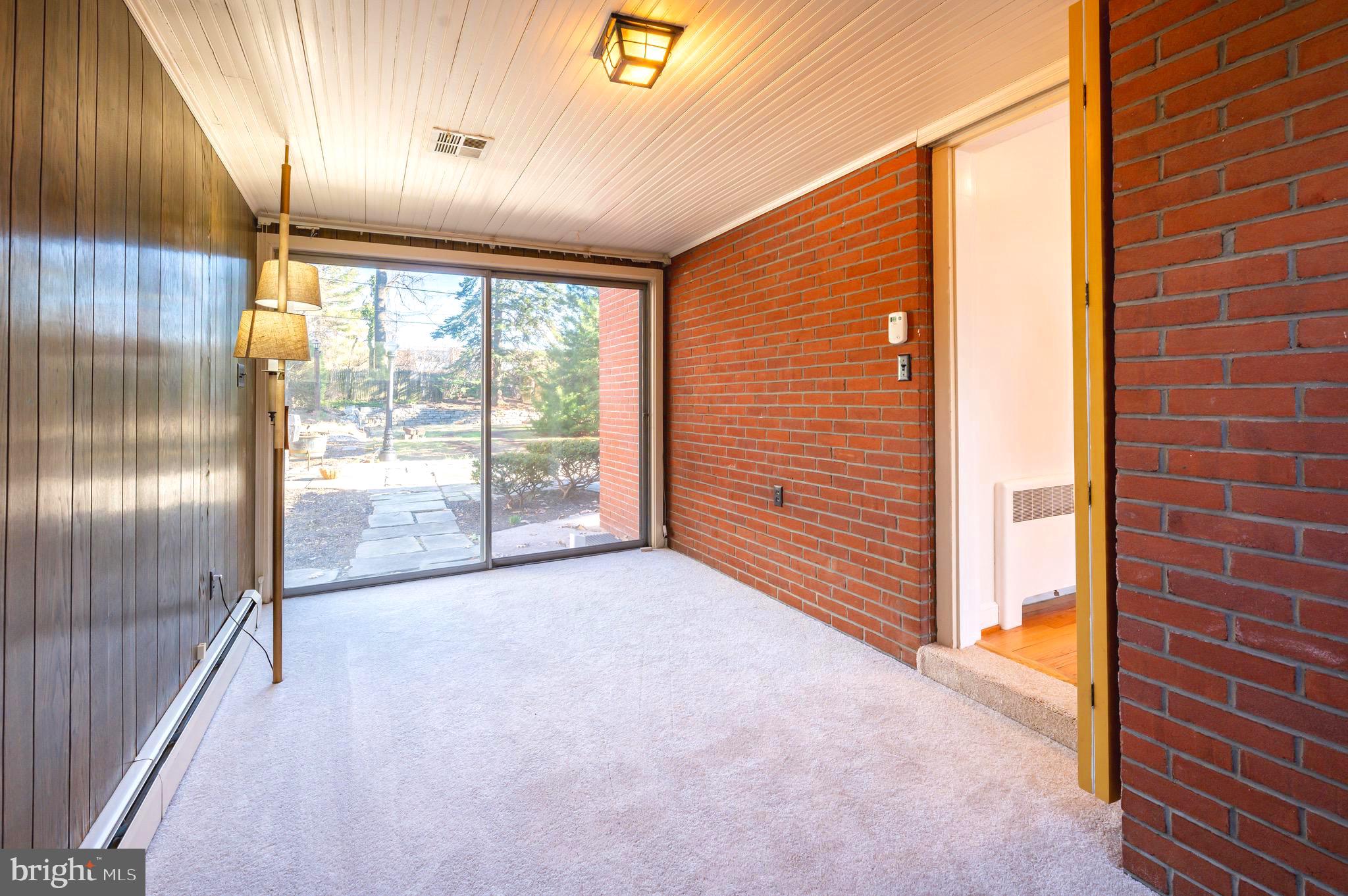 1500 Farr Road Reading, PA 19607 - Photo 33 of 35 Main level family room with access to rear patio