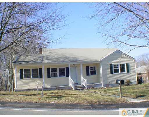 432 Morristown Road Old Bridge, NJ 07747 - Photo 1 of 6 a front view of a house with garden