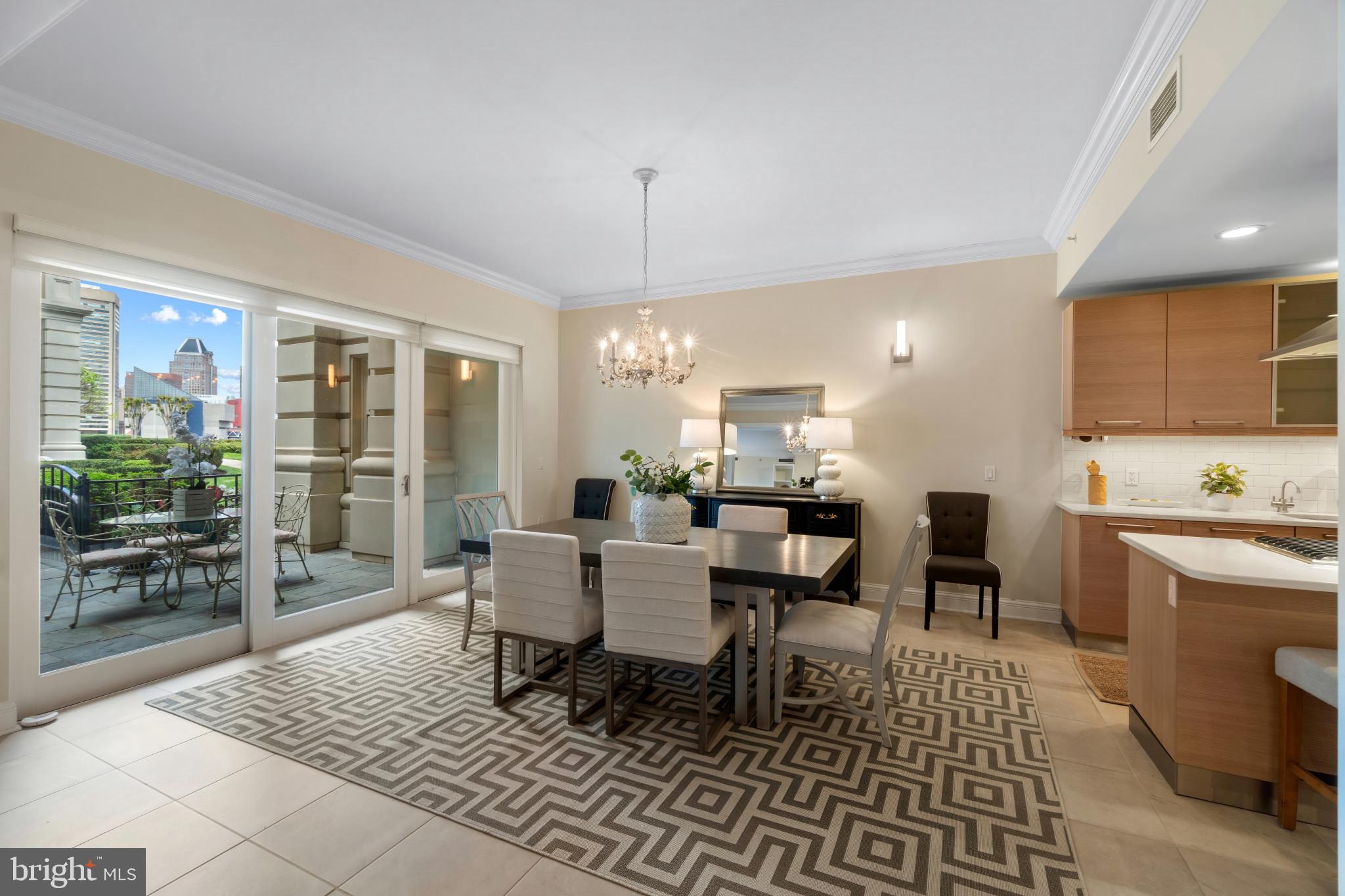 801 Key Highway, Unit 130 Baltimore, MD 21230 - Photo 11 of 52 Dining Room to Outdoor Patio