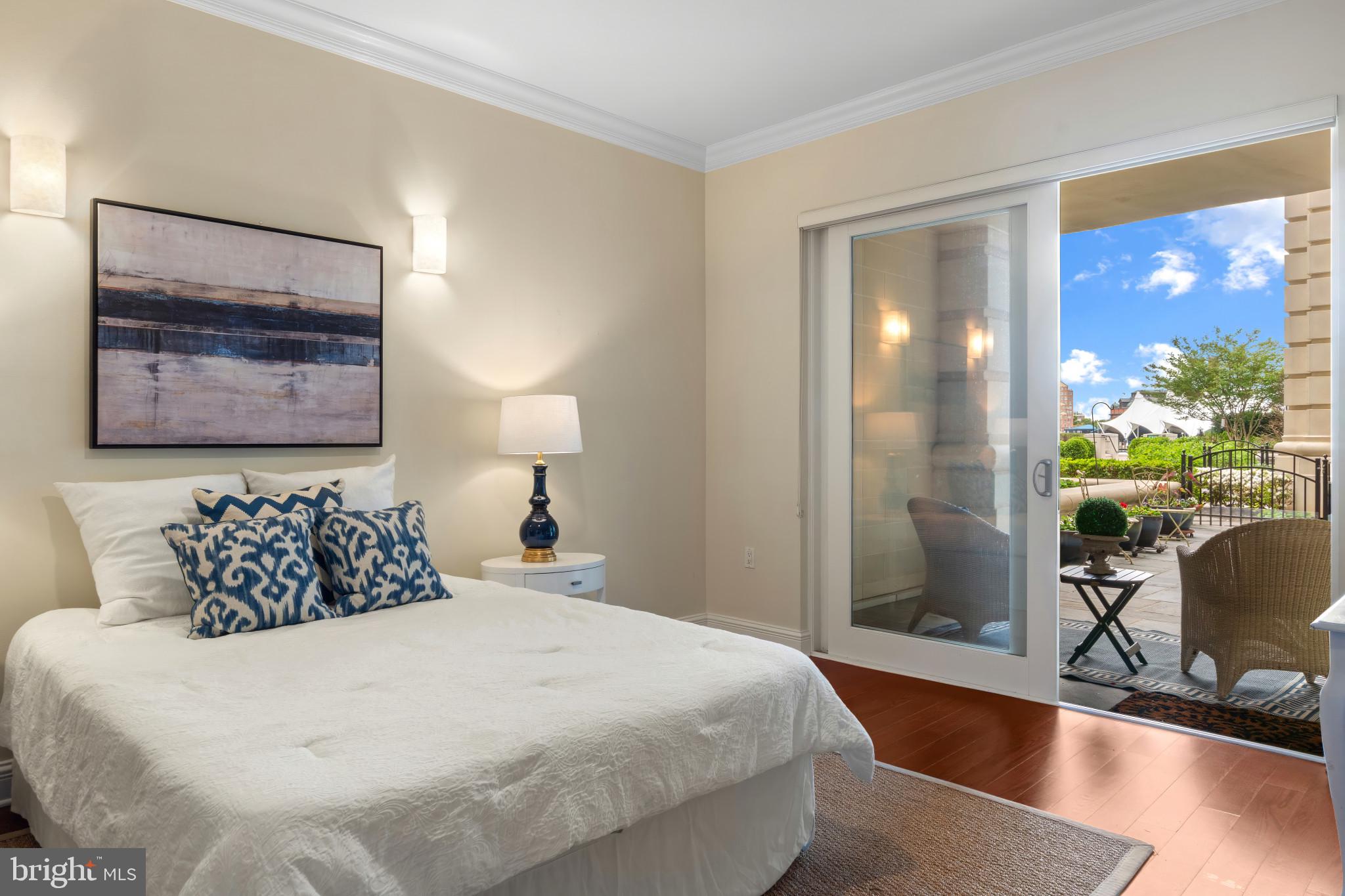 801 Key Highway, Unit 130 Baltimore, MD 21230 - Photo 23 of 52 Primary Bedroom to Outdoor Patio