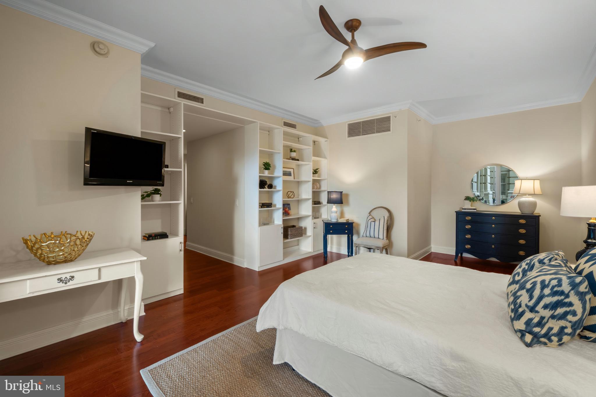 801 Key Highway, Unit 130 Baltimore, MD 21230 - Photo 25 of 52 Primary Bedroom with Builtins