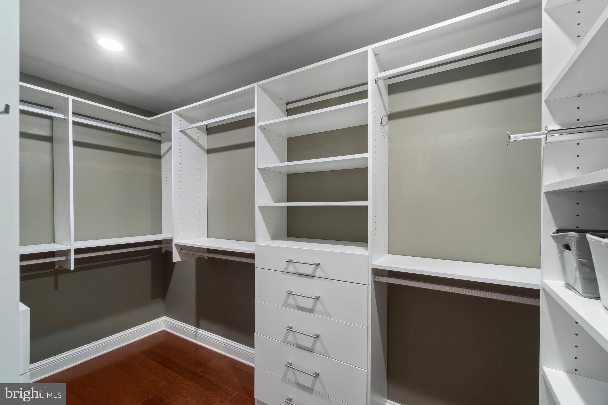 801 Key Highway, Unit 130 Baltimore, MD 21230 - Photo 29 of 52 Walk-in Closet in Primary Bedroom