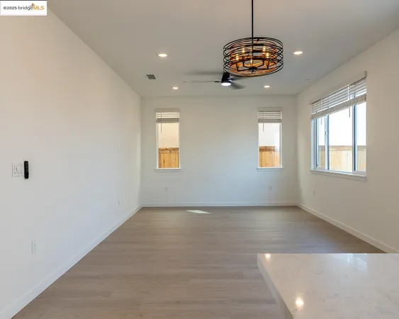 a bathroom with a toilet and a window