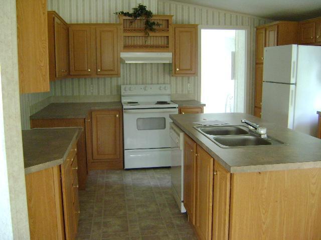1971 Lick Ridge Road Northeast Check, VA 24072 - Photo 3 of 6 a kitchen with a sink stove and refrigerator