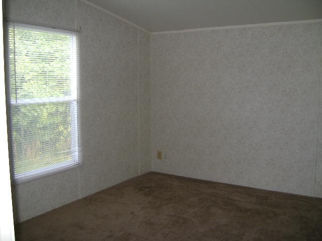 1971 Lick Ridge Road Northeast Check, VA 24072 - Photo 4 of 6 an empty room with a window