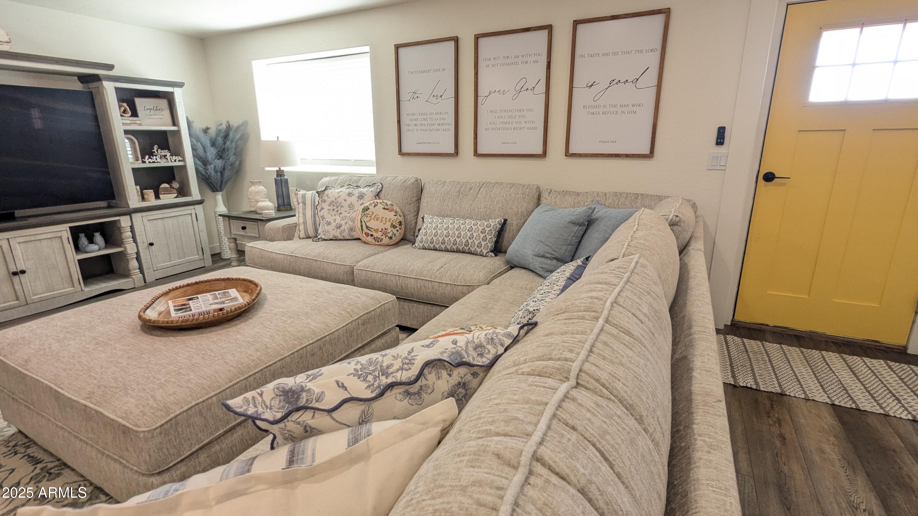 157 Frontage Road Concho, AZ 85924 - Photo 11 of 69 a living room with furniture and a flat screen tv