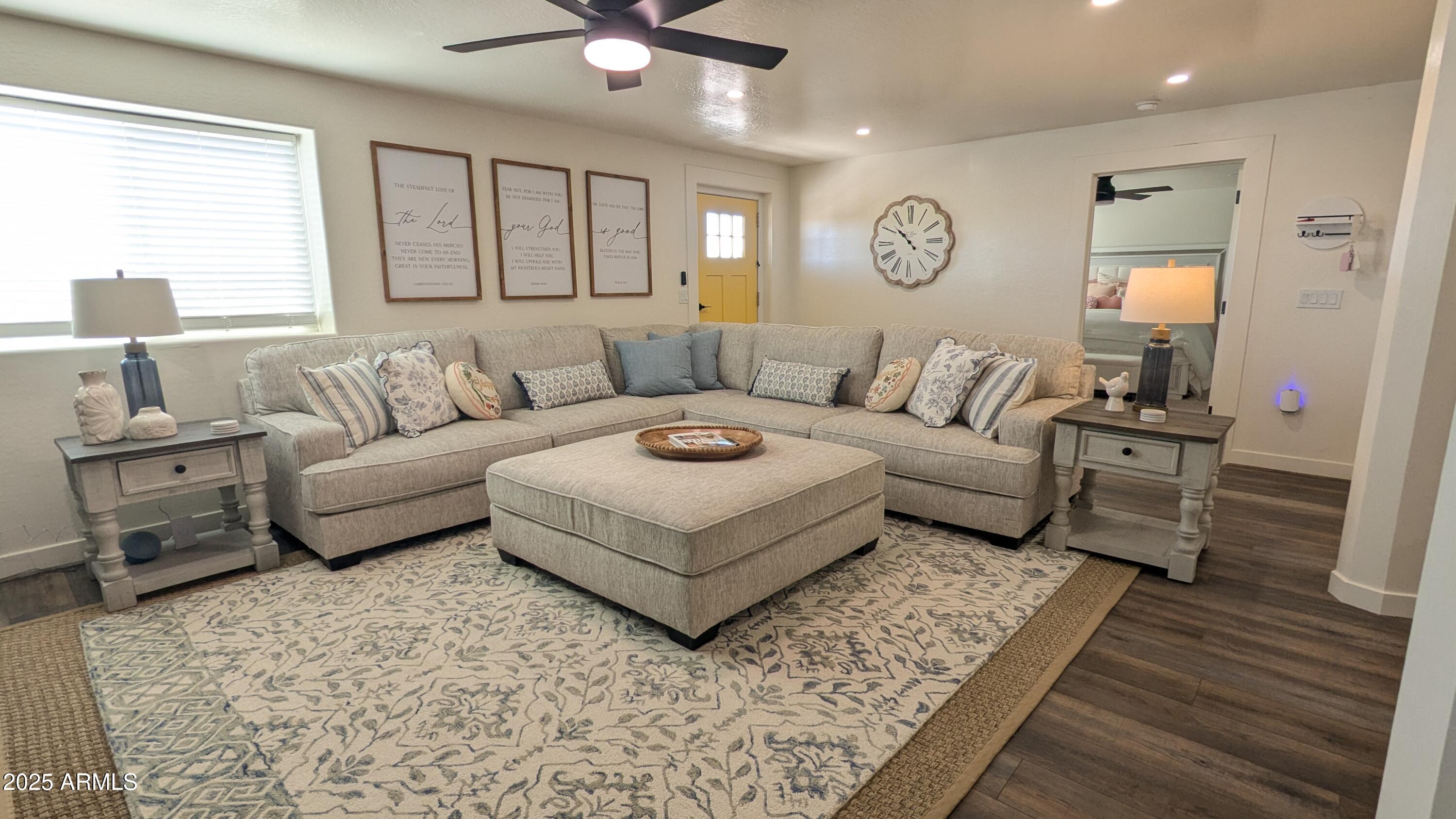 157 Frontage Road Concho, AZ 85924 - Photo 12 of 69 a living room with furniture and a large window