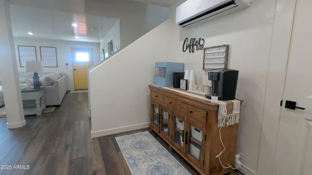 a bedroom with a bed and a cabinets