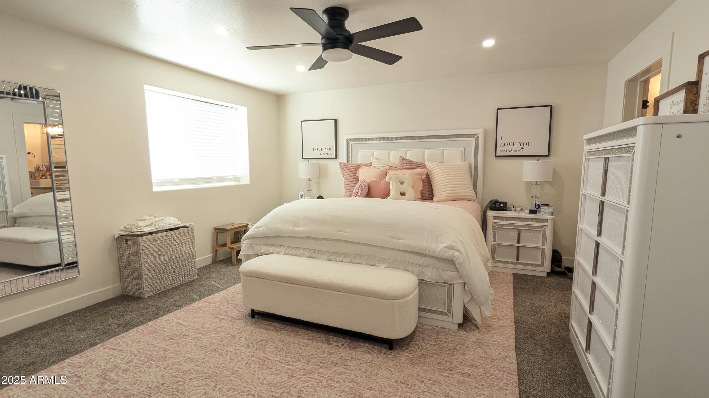 157 Frontage Road Concho, AZ 85924 - Photo 17 of 69 a bedroom with a bed dresser and a window