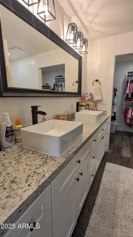 a view of living room with furniture and flat screen tv