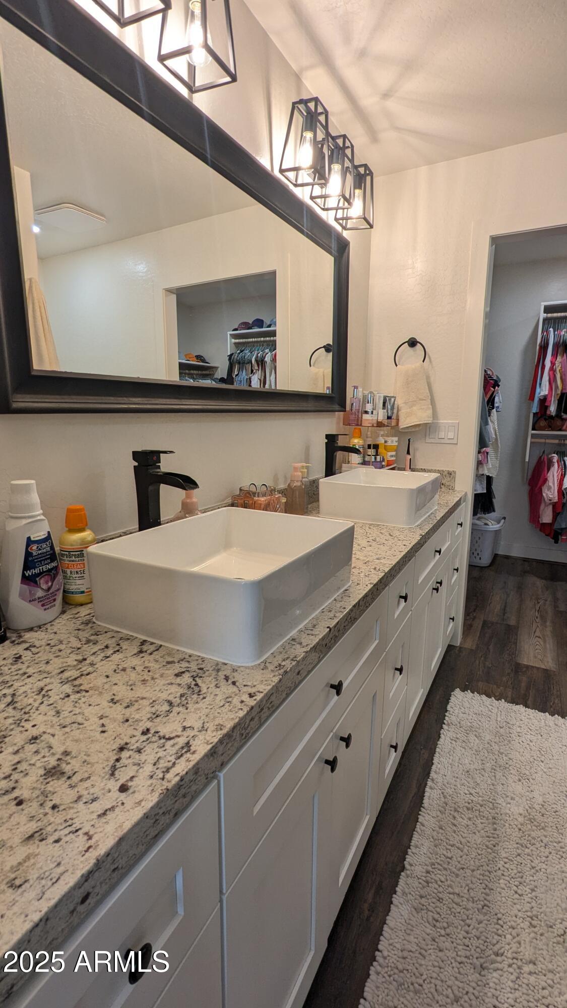 157 Frontage Road Concho, AZ 85924 - Photo 21 of 69 a bathroom with a sink and a mirror