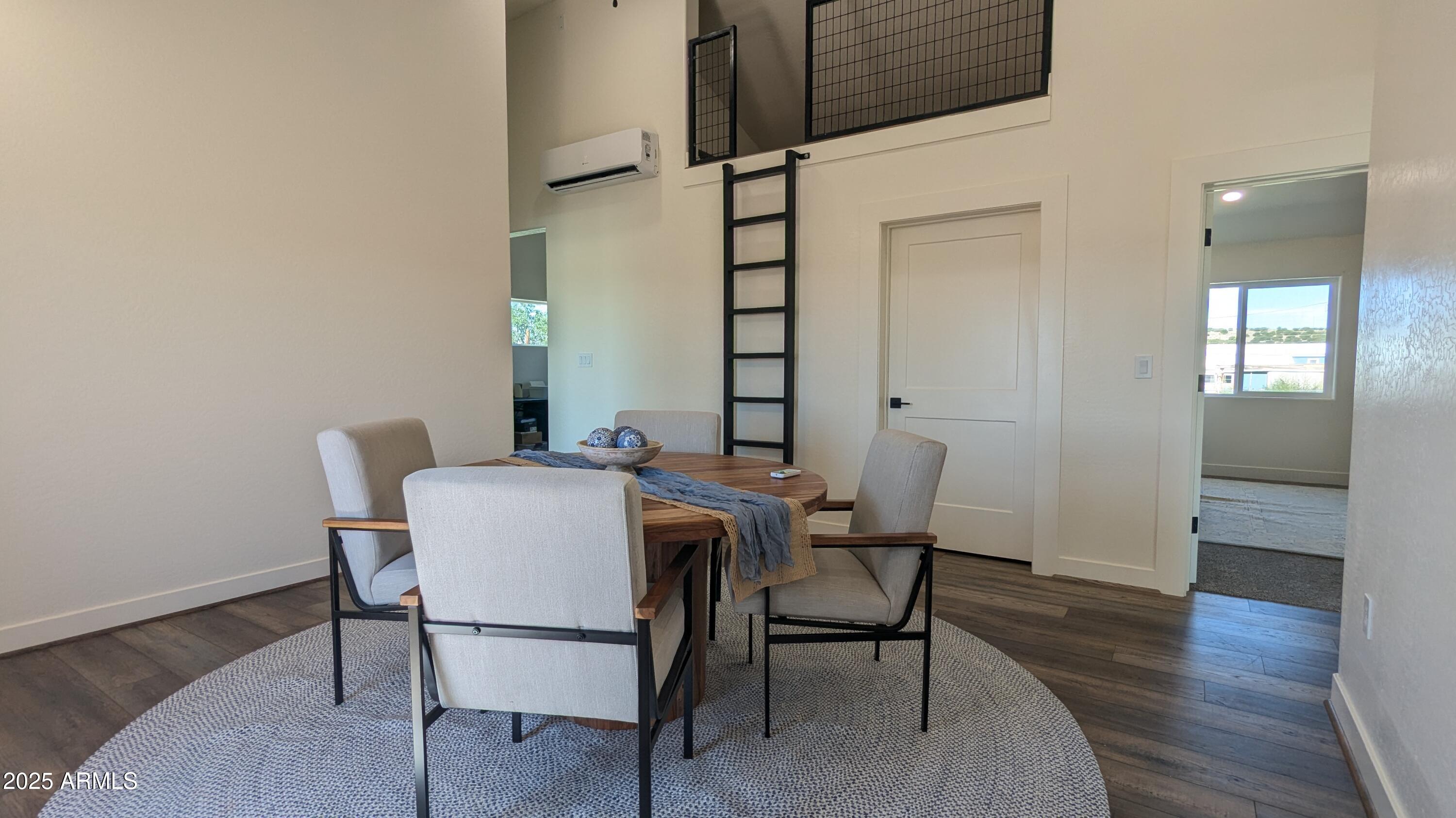157 Frontage Road Concho, AZ 85924 - Photo 23 of 69 a dining room with furniture and wooden floor