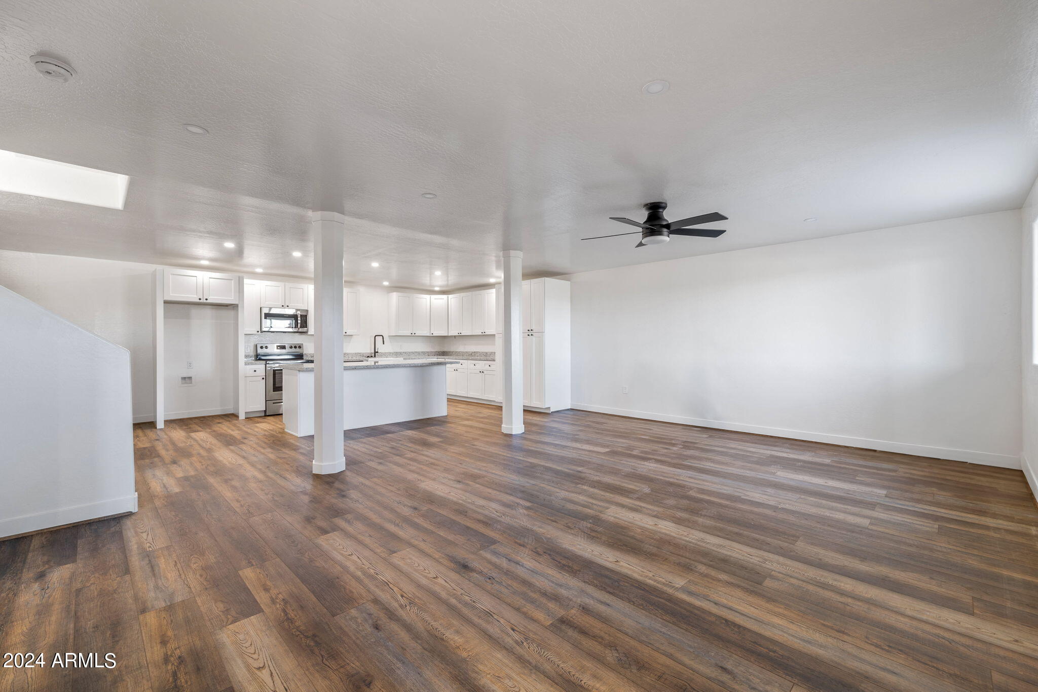 157 Frontage Road Concho, AZ 85924 - Photo 30 of 69 a view of a kitchen with a sink and a refrigerator