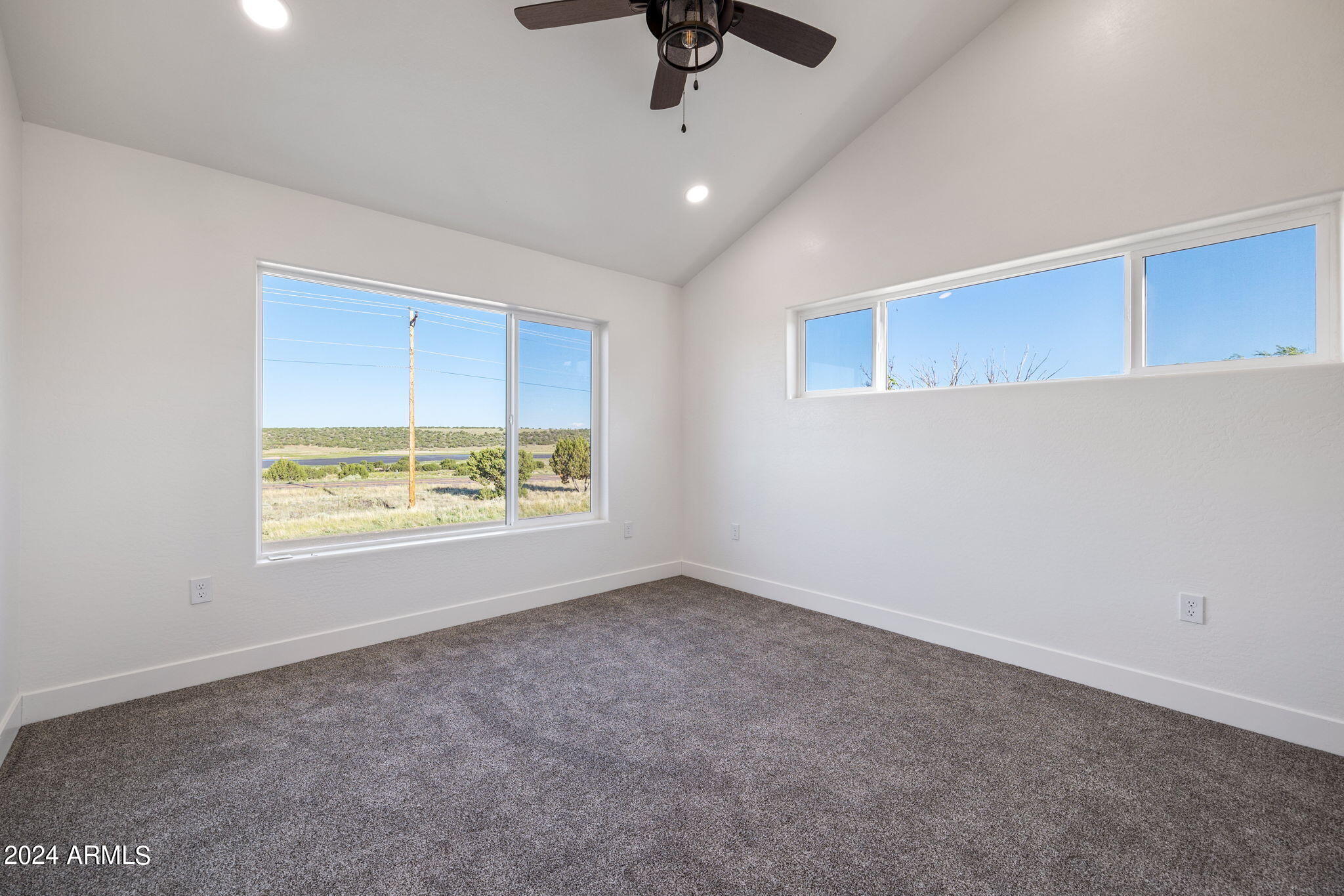 157 Frontage Road Concho, AZ 85924 - Photo 45 of 69 a view of an empty room with a window