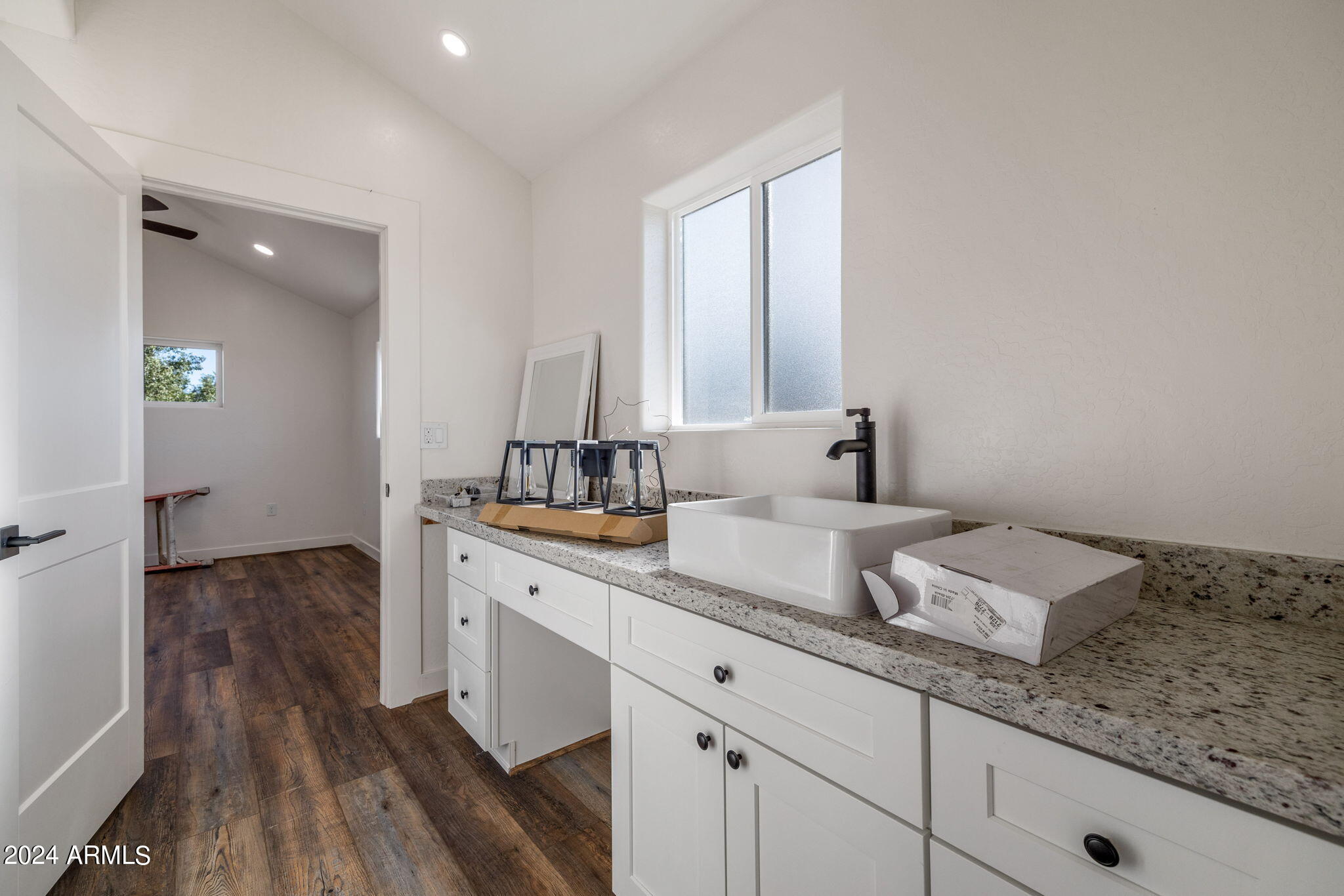 157 Frontage Road Concho, AZ 85924 - Photo 54 of 69 a spacious bathroom with double vanity and a mirror