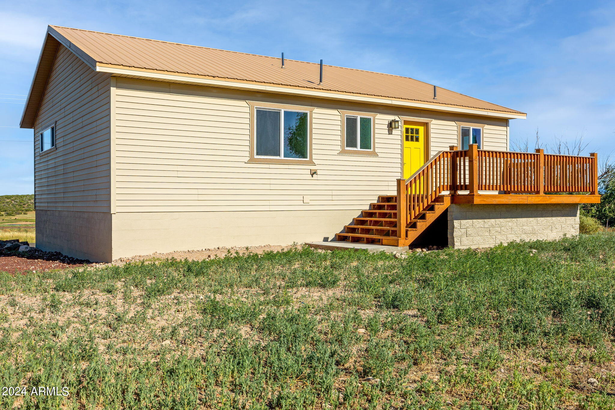 157 Frontage Road Concho, AZ 85924 - Photo 57 of 69 a view of a house with backyard and wooden fence