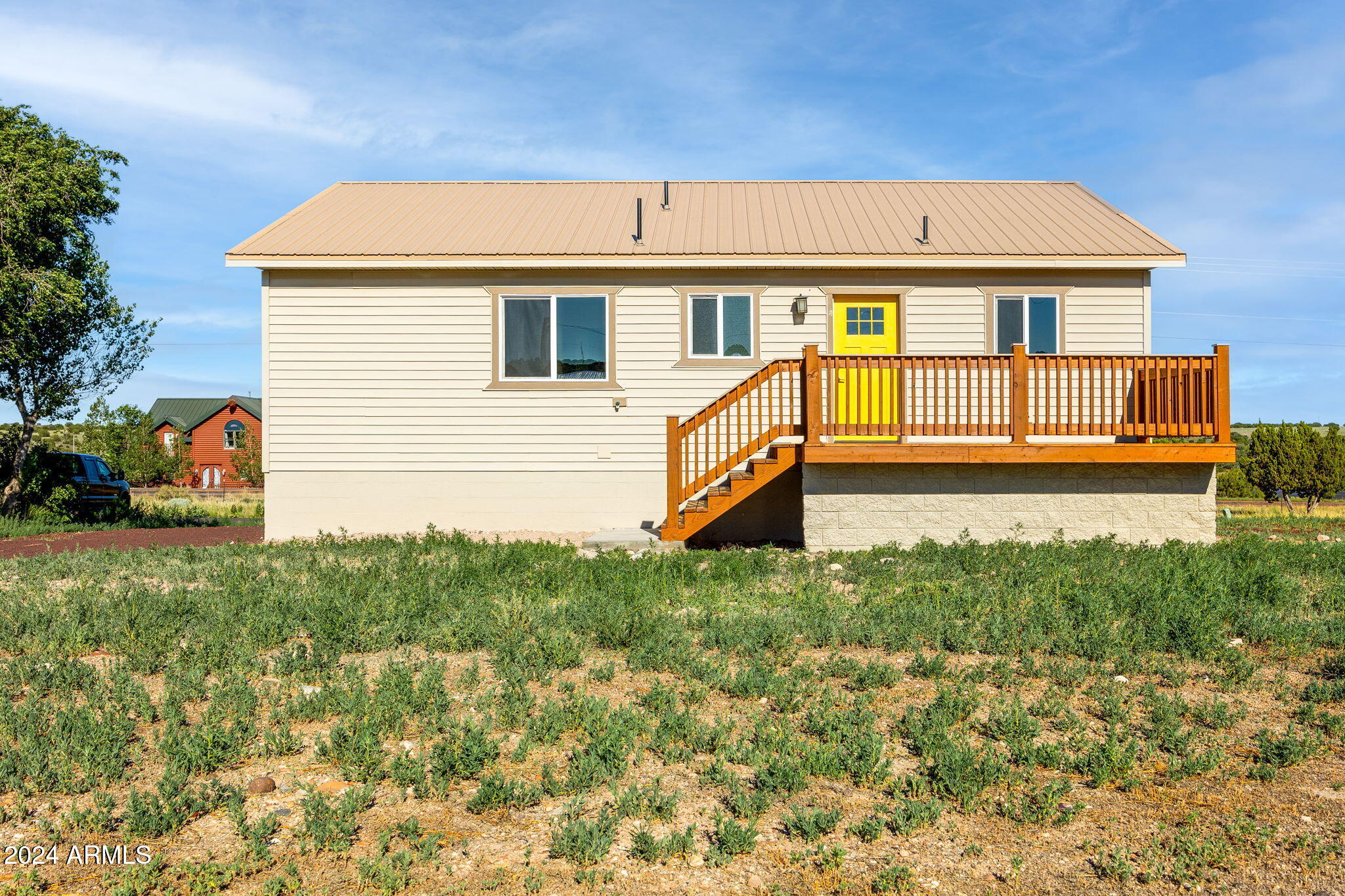 157 Frontage Road Concho, AZ 85924 - Photo 60 of 69 a front view of a house with a yard