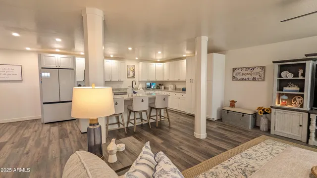a kitchen with a table and chairs