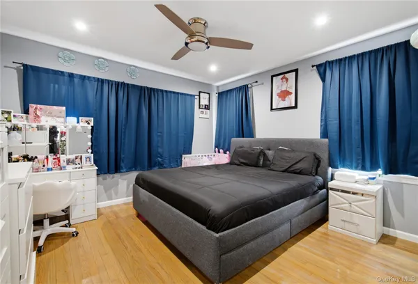a living room with a bed and furniture