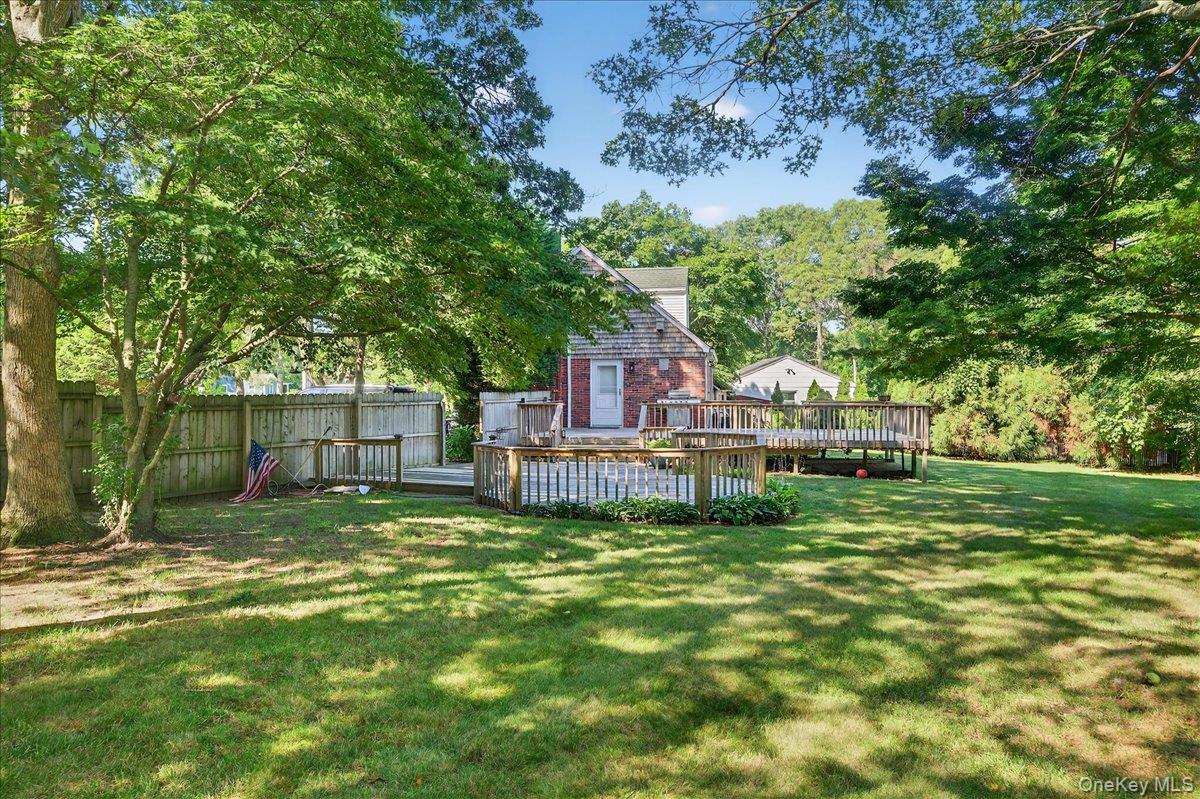 188 Donegan Avenue East Patchogue, NY 11772 - Photo 19 of 25 a house view with a sitting space and garden