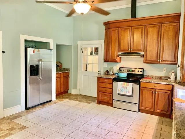 a view of a storage & utility room with wooden floor
