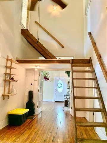 an aerial view of a residential houses with outdoor space