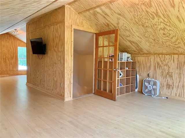 a view of a lake with a yard