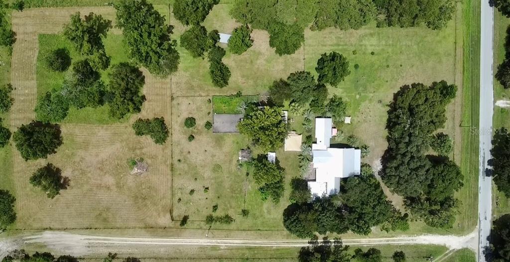 9150 Southwest 151st Lane Archer, FL 32618 - Photo 62 of 81 an aerial view of a residential houses with outdoor space