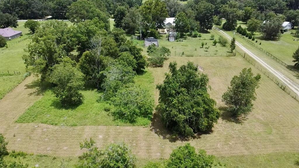 9150 Southwest 151st Lane Archer, FL 32618 - Photo 64 of 81 a view of a lake with a yard
