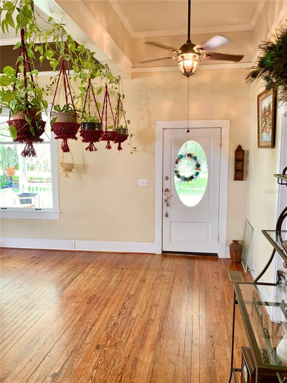 9150 Southwest 151st Lane Archer, FL 32618 - Photo 7 of 81 a view of a room with wooden floor and window