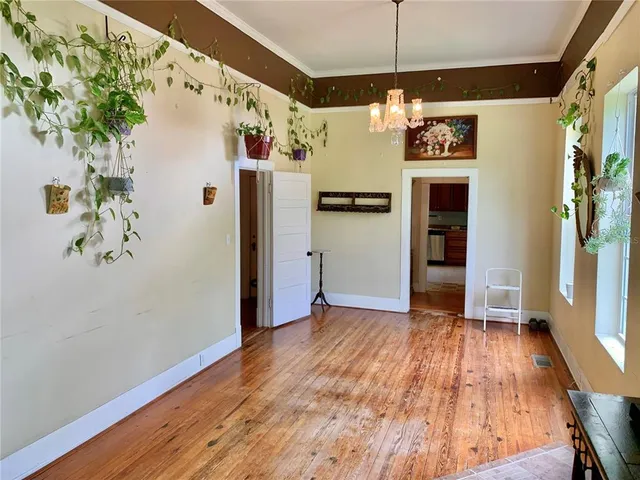a kitchen with stainless steel appliances granite countertop a refrigerator and a stove