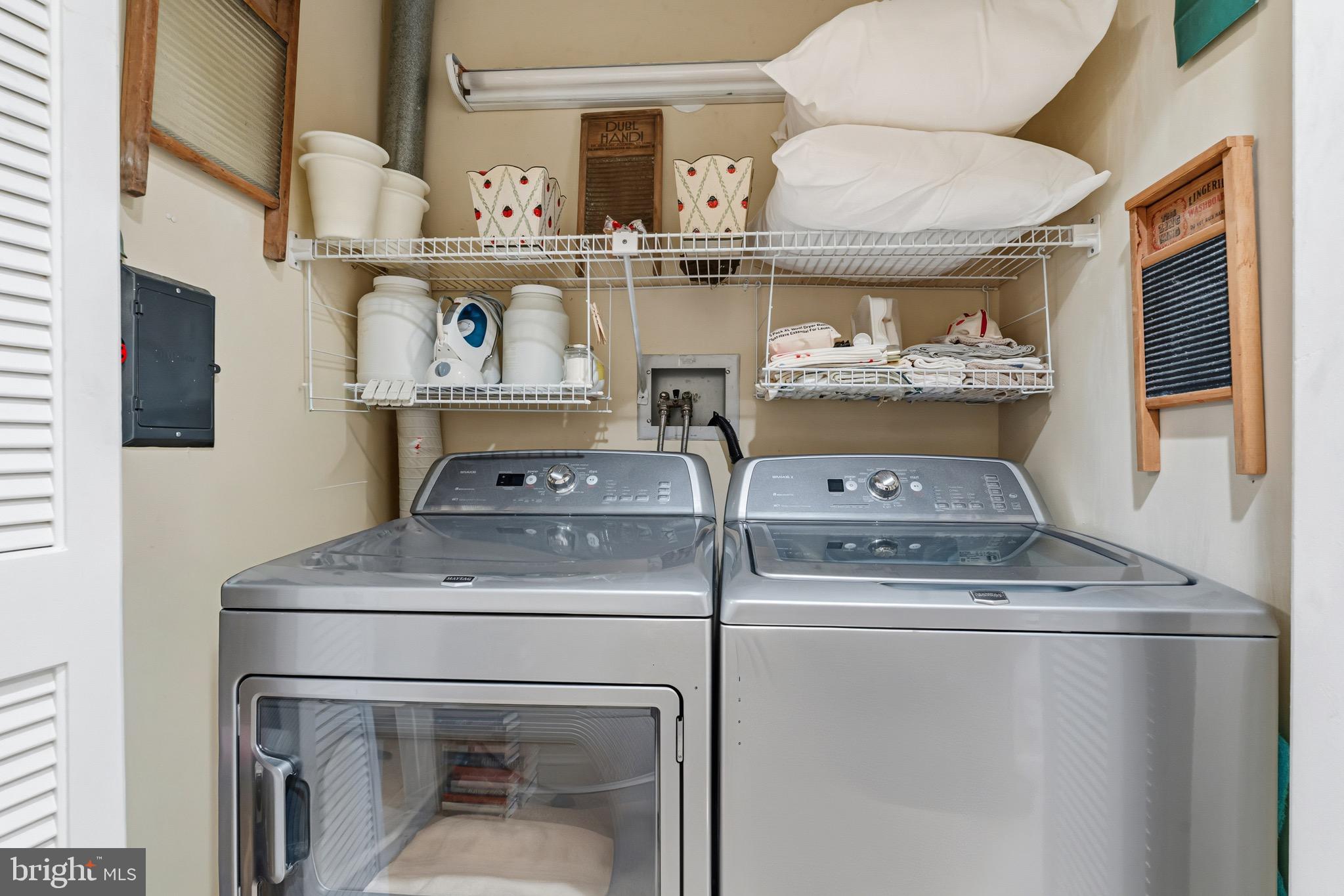 10 East Lee Street, Unit 2008 Baltimore, MD 21202 - Photo 23 of 23 a stove top oven sitting inside of a kitchen