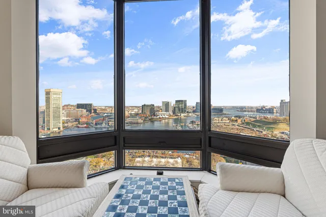a view of a balcony with furniture