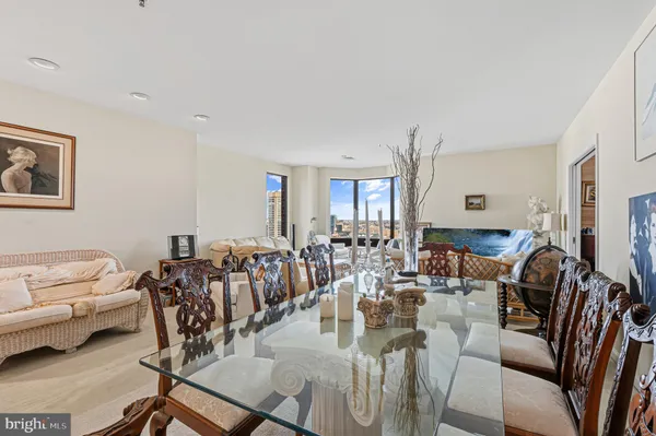 a view of a livingroom with furniture and lounge chair