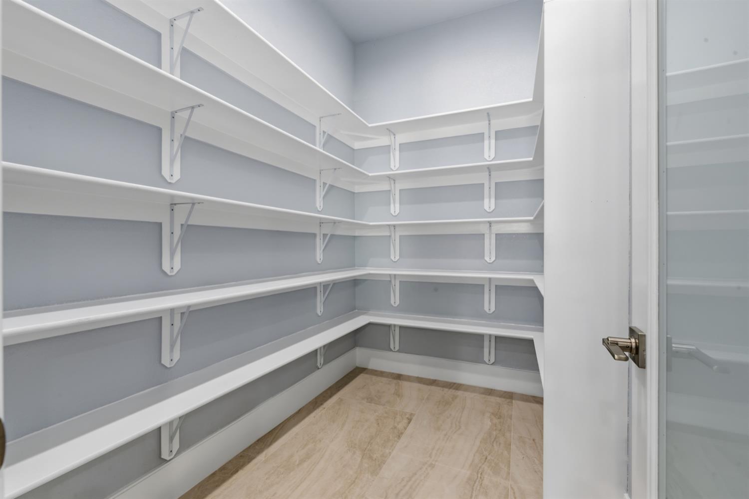 2009 Robin Hood Lane Merced, CA 95340 - Photo 15 of 50 a view of walk in closet with empty racks