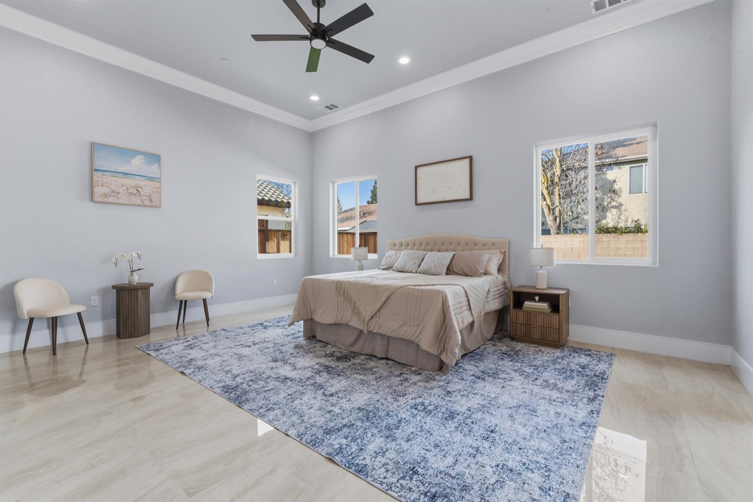 2009 Robin Hood Lane Merced, CA 95340 - Photo 21 of 50 a bedroom with a bed a table and chair