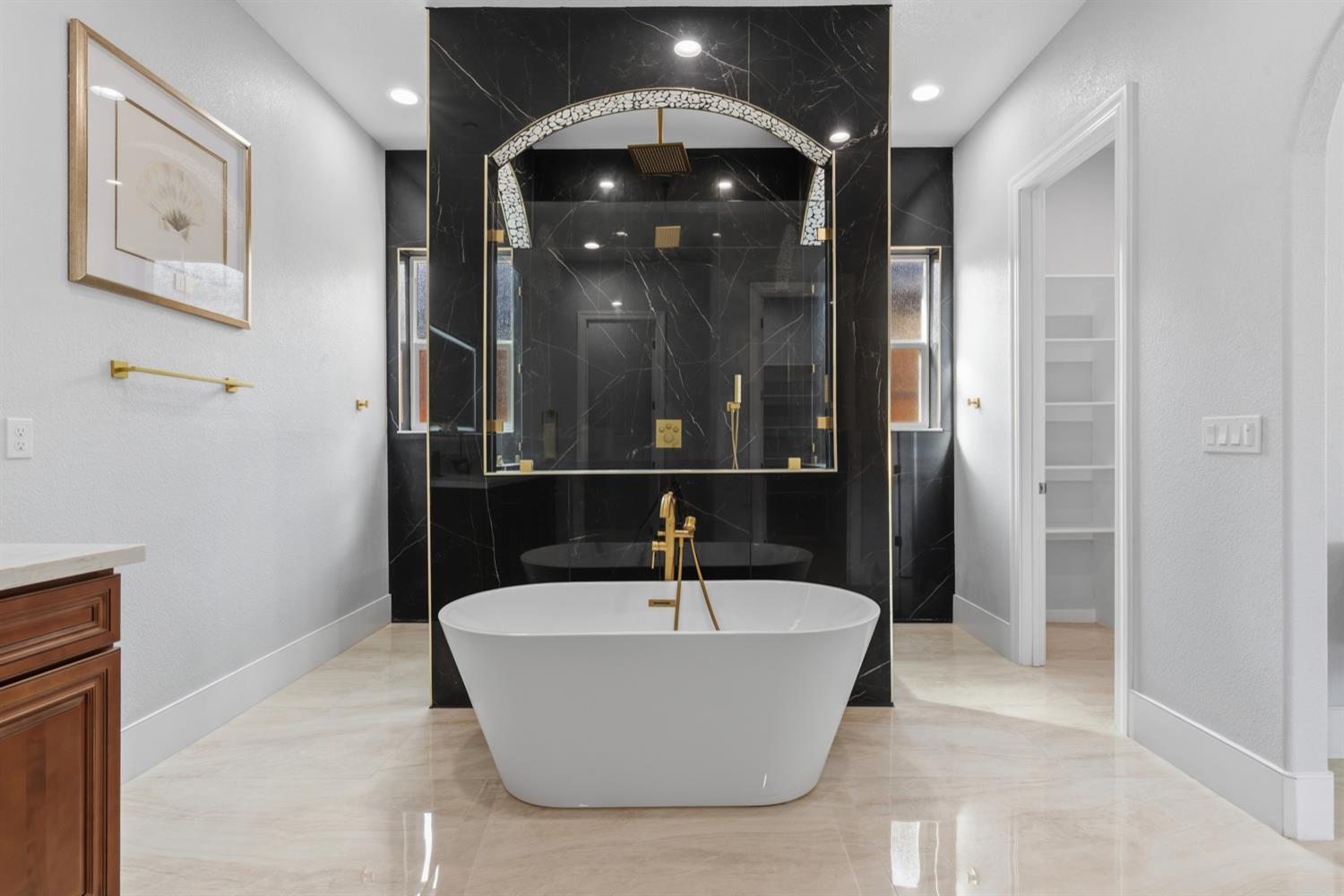 2009 Robin Hood Lane Merced, CA 95340 - Photo 24 of 50 a bathroom with a bathtub and shower