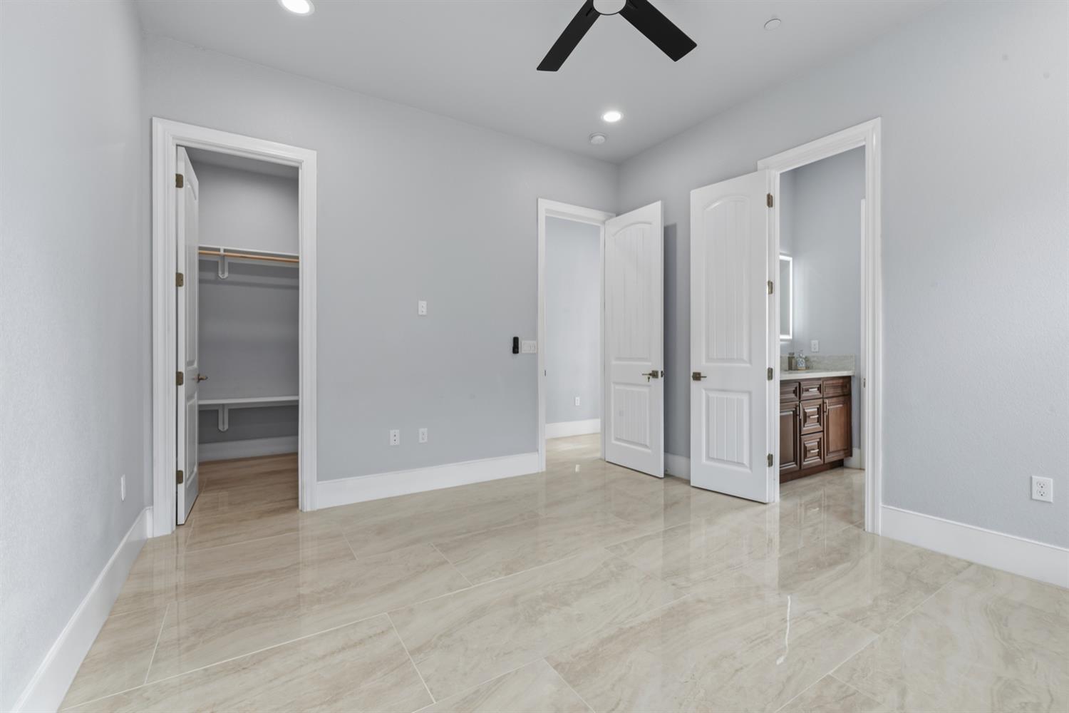 2009 Robin Hood Lane Merced, CA 95340 - Photo 30 of 50 an empty room with closet and windows