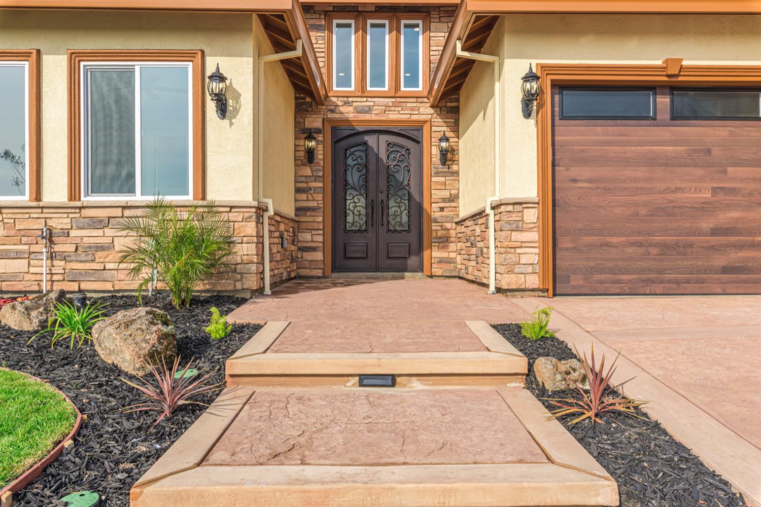 2009 Robin Hood Lane Merced, CA 95340 - Photo 3 of 50 a front view of a house with a yard