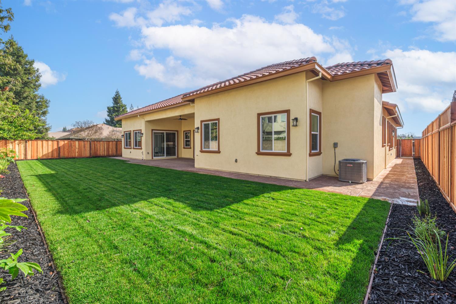 2009 Robin Hood Lane Merced, CA 95340 - Photo 42 of 50 a view of a house with backyard and porch