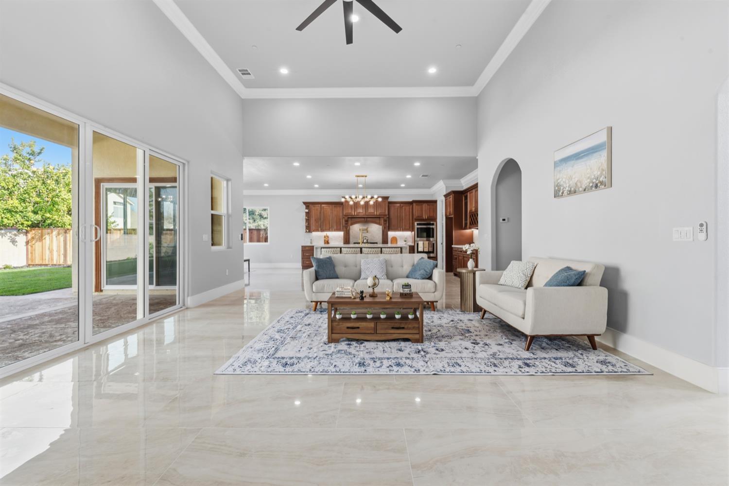 2009 Robin Hood Lane Merced, CA 95340 - Photo 7 of 50 a living room with furniture and a floor to ceiling window