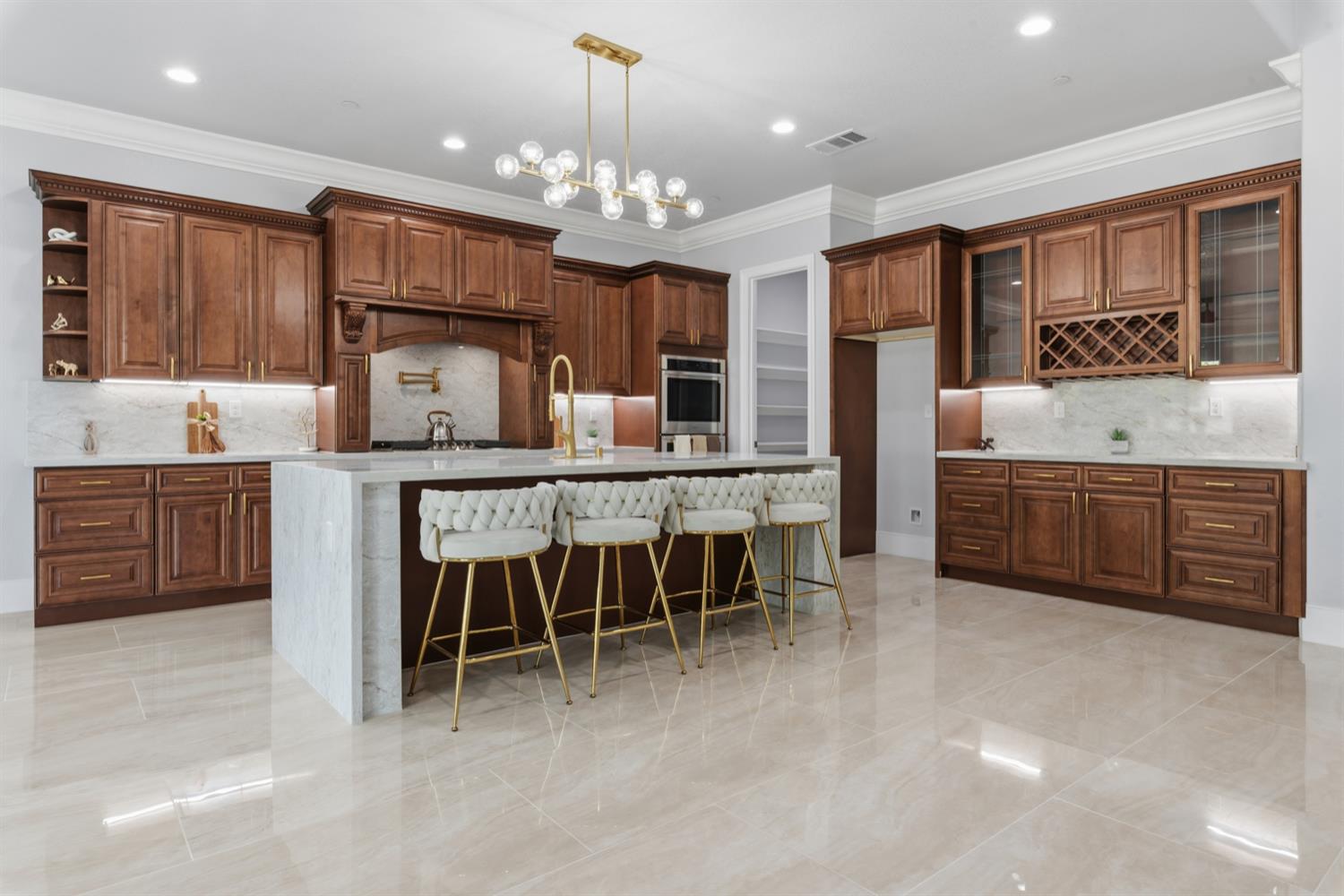 2009 Robin Hood Lane Merced, CA 95340 - Photo 9 of 50 a large kitchen with a table and chairs in it