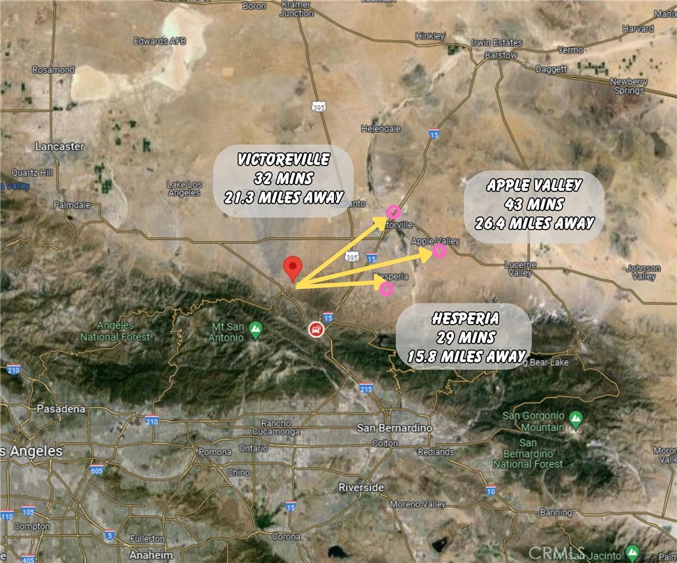 10 Campanula Road Phelan, CA 92371 - Photo 3 of 3 a sign that is sitting on a brick wall