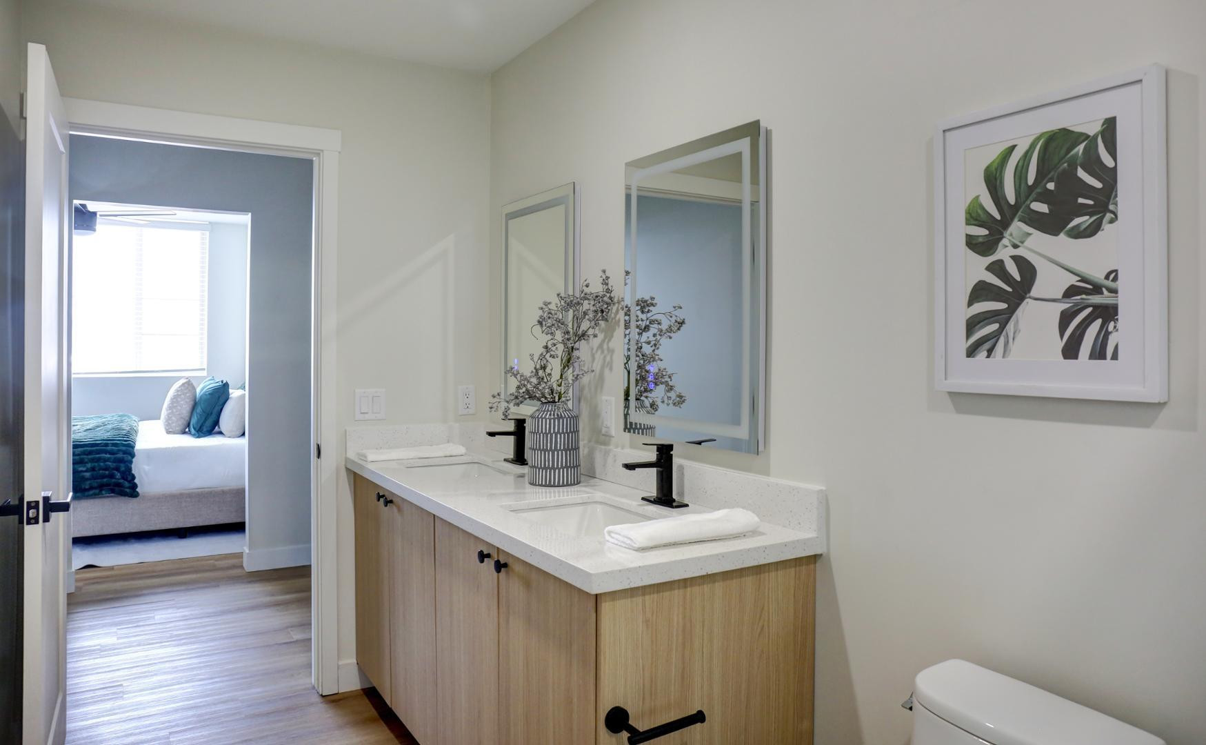 630 North Power Road, Unit 111 Mesa, AZ 85205 - Photo 5 of 13 a bathroom with a sink and a mirror