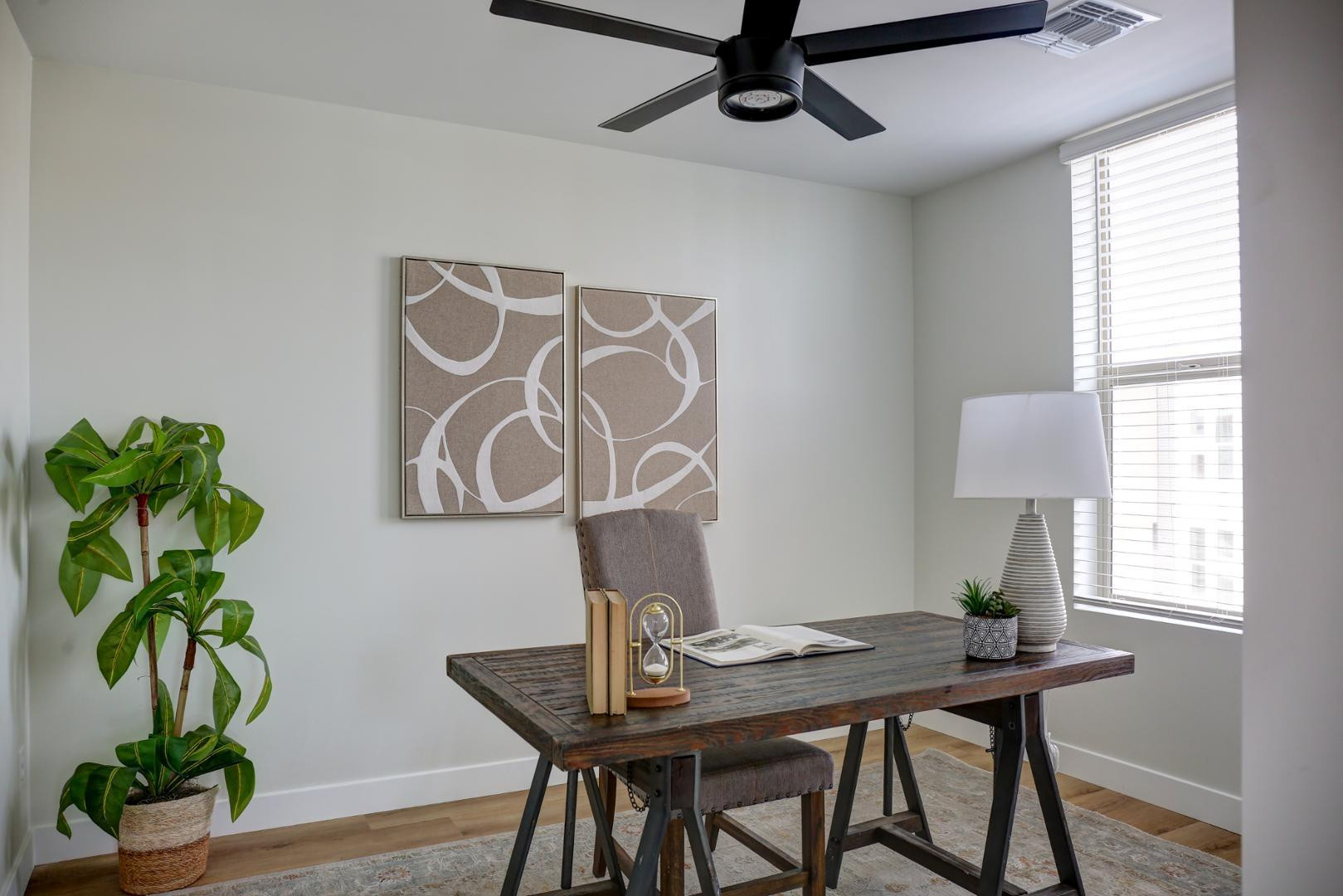 630 North Power Road, Unit 111 Mesa, AZ 85205 - Photo 7 of 13 a view of a workspace with furniture and a window