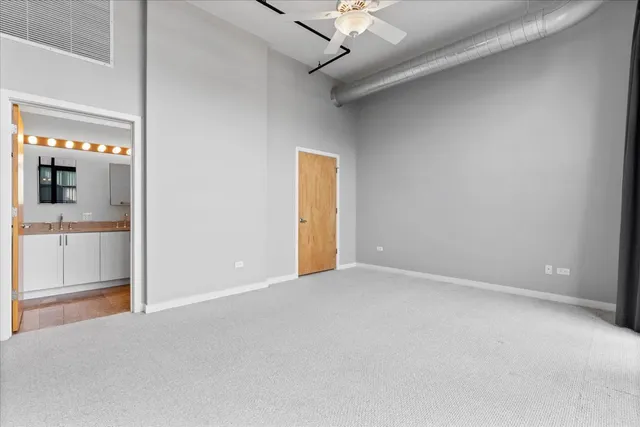 a balcony with furniture and flowers